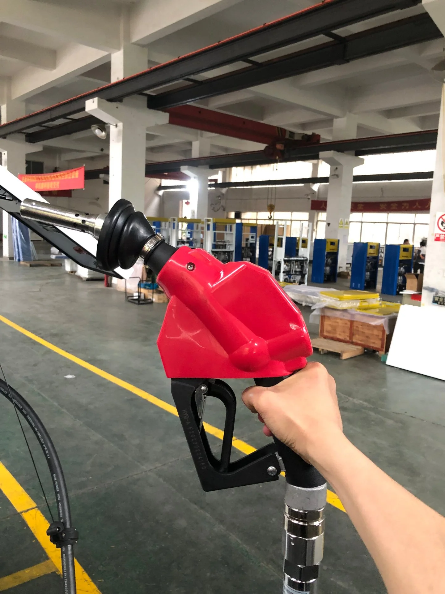Stage II VR nozzle held in hand at the dispenser